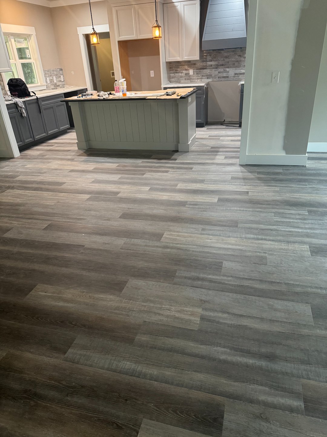 Immaculate LVP installation for this brand new home built in Clanton, Alabama.